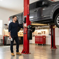 Two Post Car Lift Engineered for Heavy Duty Use, 12000 Lb Capacity, 70.87 Inch Height, Dual Hydraulic — Lifestyle